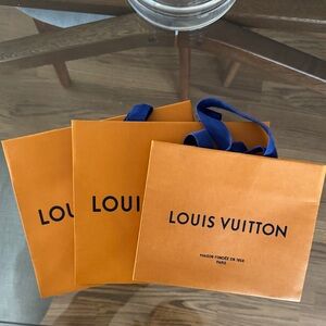 Louis Vuitton Bold Orange Bags with Blue Handles
